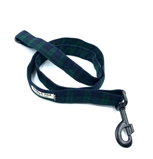 A Black Watch tartan dog lead with a comfortable loop handle, an accessory attachment ring, and a strong, antique-style steel trigger clip.