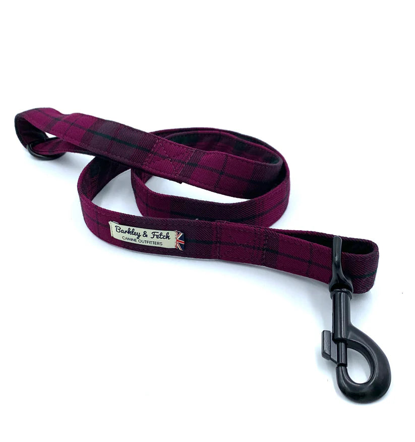 A mulberry tartan dog lead with a comfortable loop handle, an accessory attachment ring, and a strong, antique-style steel trigger clip.