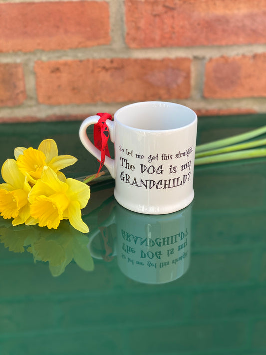 “The dog is my grandchild” mug